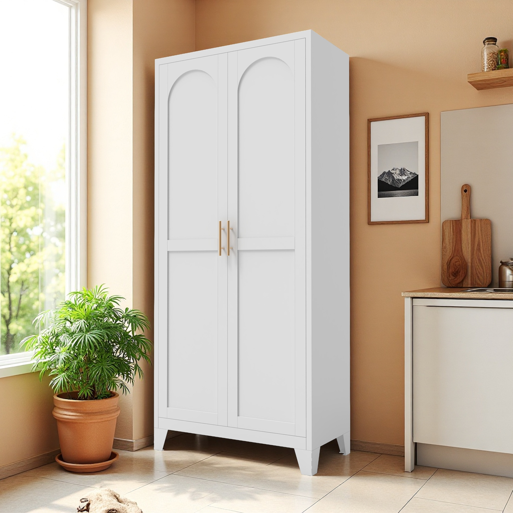 Little Arch 71 cabinet in Chalk in a sunlit room beside a window and a potted plant