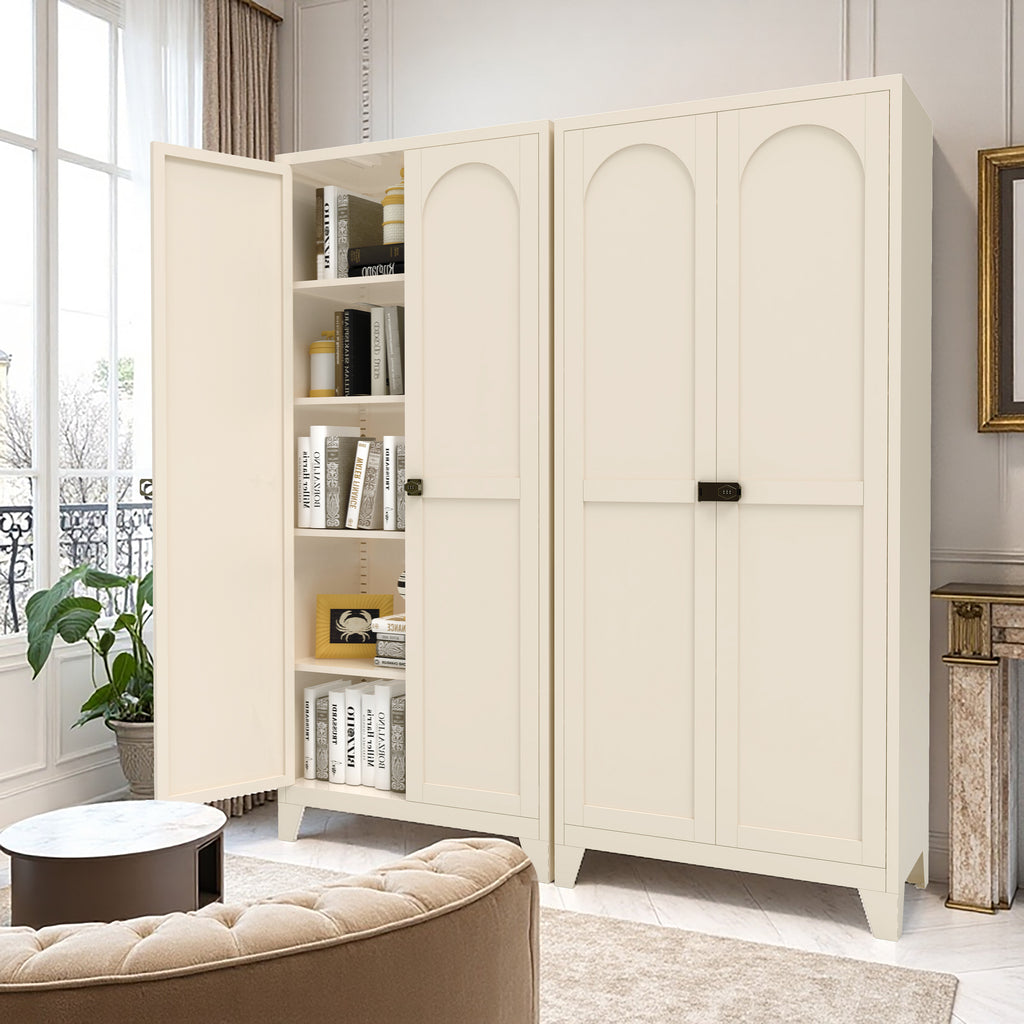 Two Little Arch 71 cabinets in Oat side by side in a living room, one open with books on the shelves