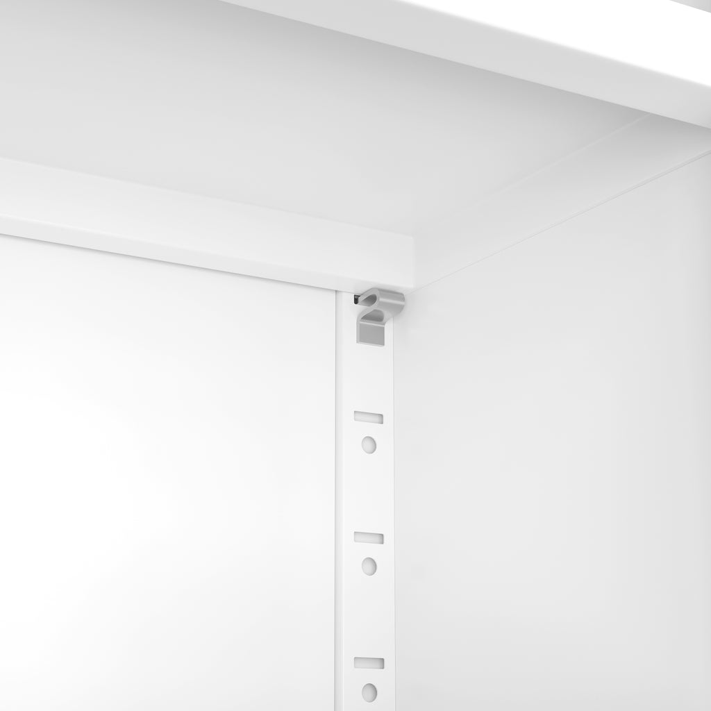 Close-up of the shelf pins and holes for adjusting the shelves on Bookcase 71
