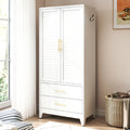 Louvered Wardrobe 71 in Chalk by a window, doors closed
